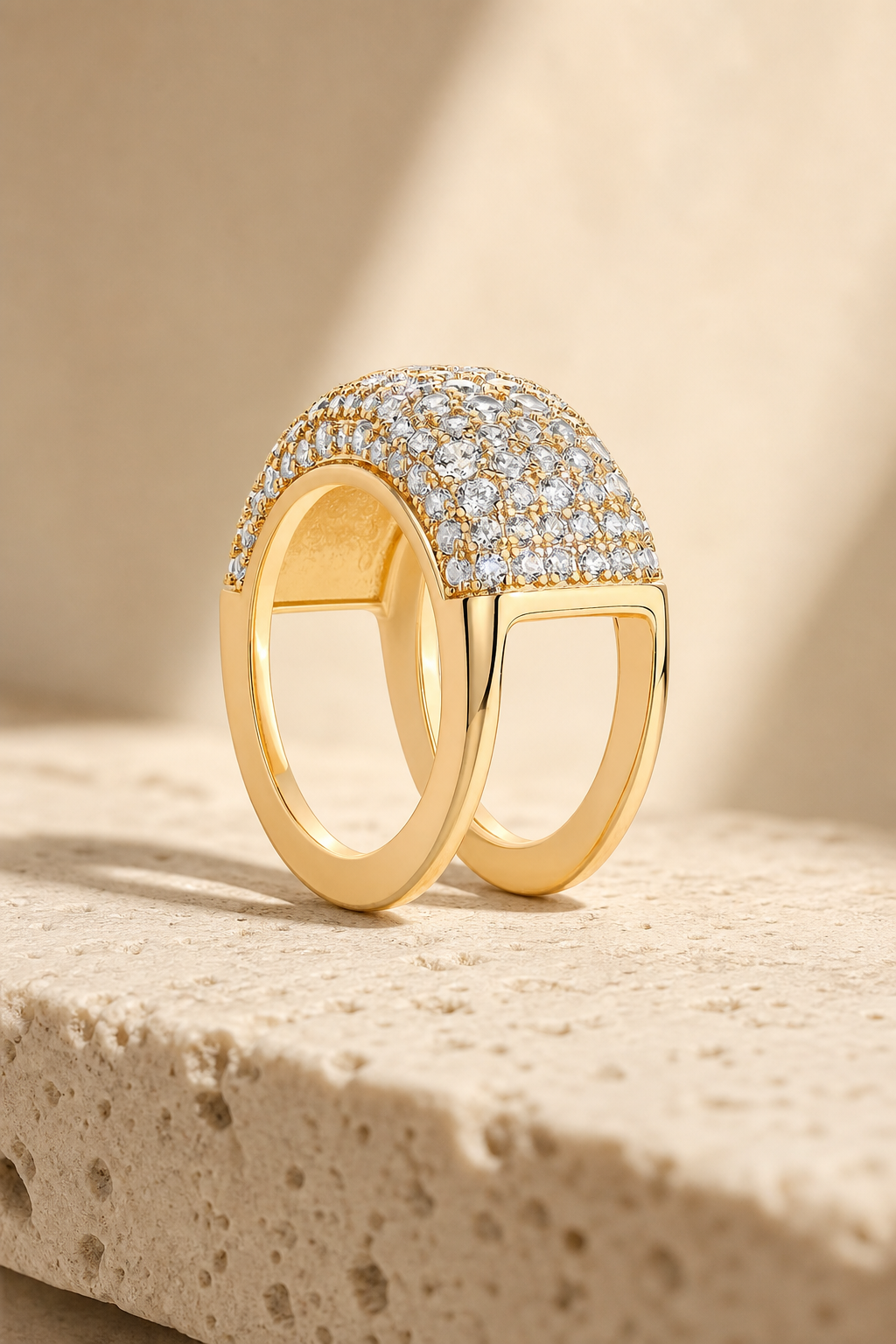 Yellow gold Cupola pave ring cover on travertine