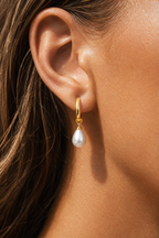 Macro of pearl and gold thread