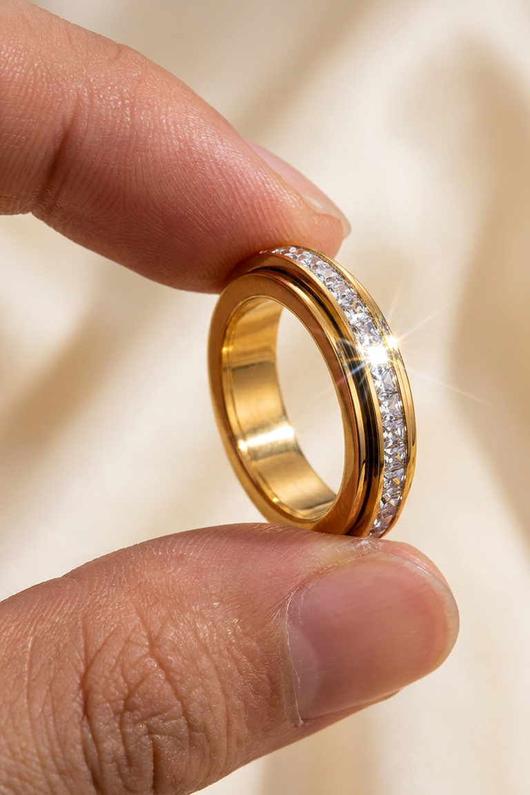 Spinning the gold Calma ring between thumb and finger
