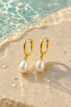 Water on the pearl drop earrings