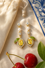 Maiori lemon studs flat lay