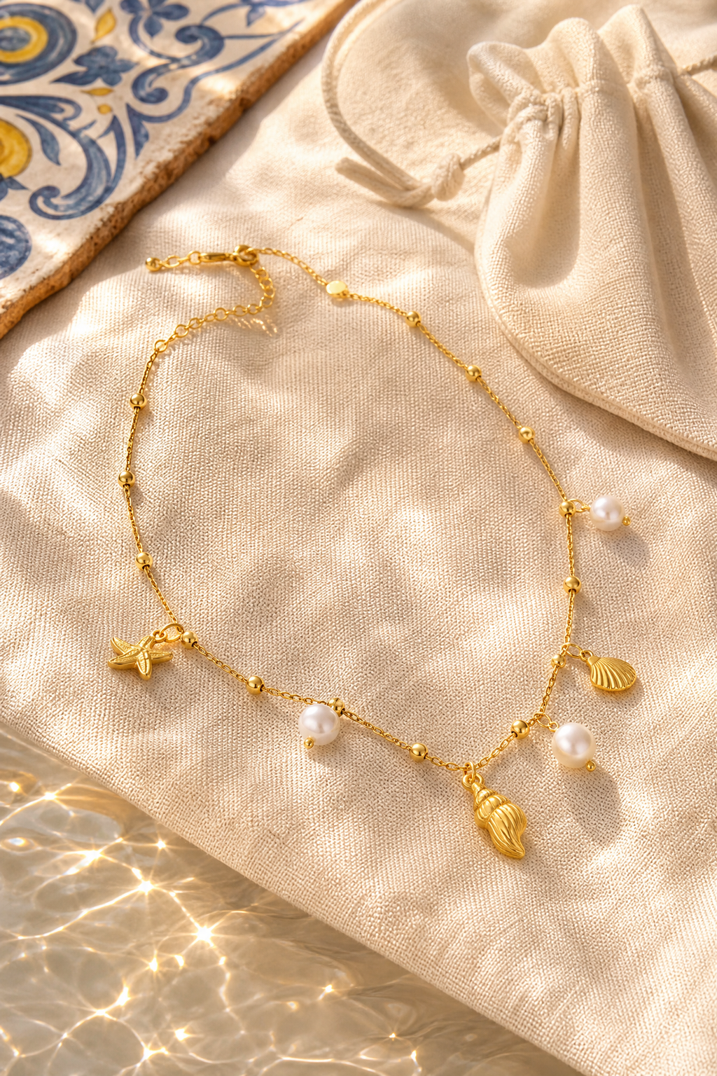 Cetara shell necklace resort flat lay