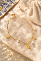 Cetara shell necklace resort flat lay