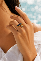 Blue stone ring worn