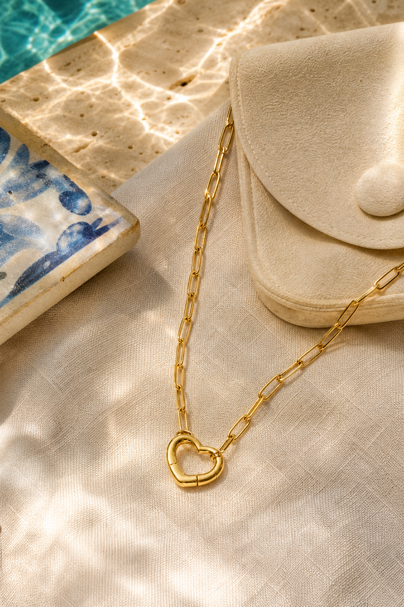 Capri carabiner necklace flat lay