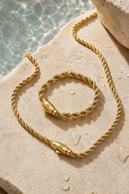 Water on the gold rope chain