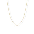 Stellina station necklace in yellow gold, full length on white