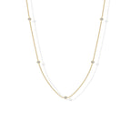 Stellina station necklace in yellow gold, full length on white