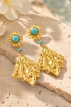 Macro detail of turquoise and hammered gold
