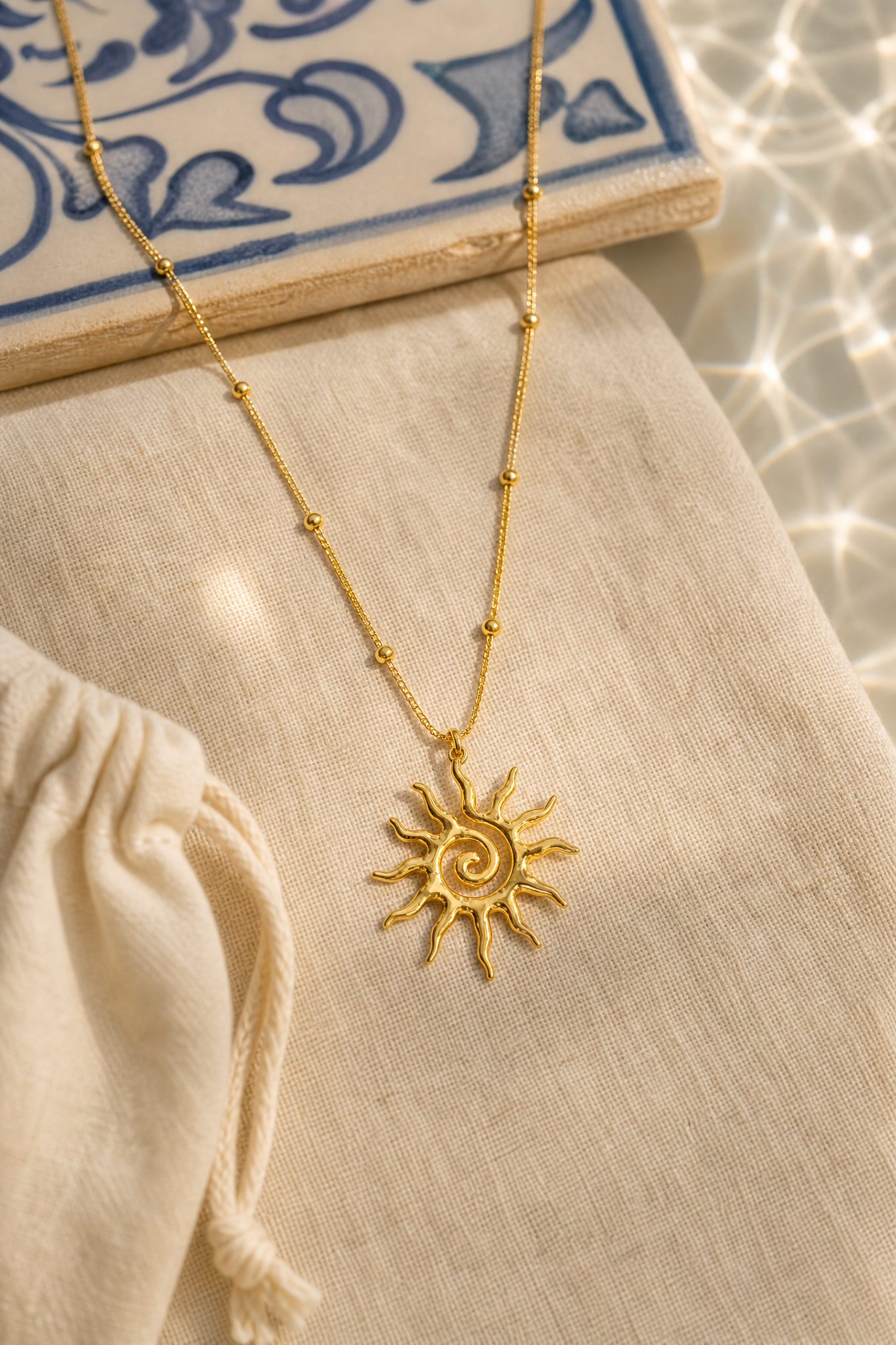 Ravello sun pendant resort flat lay