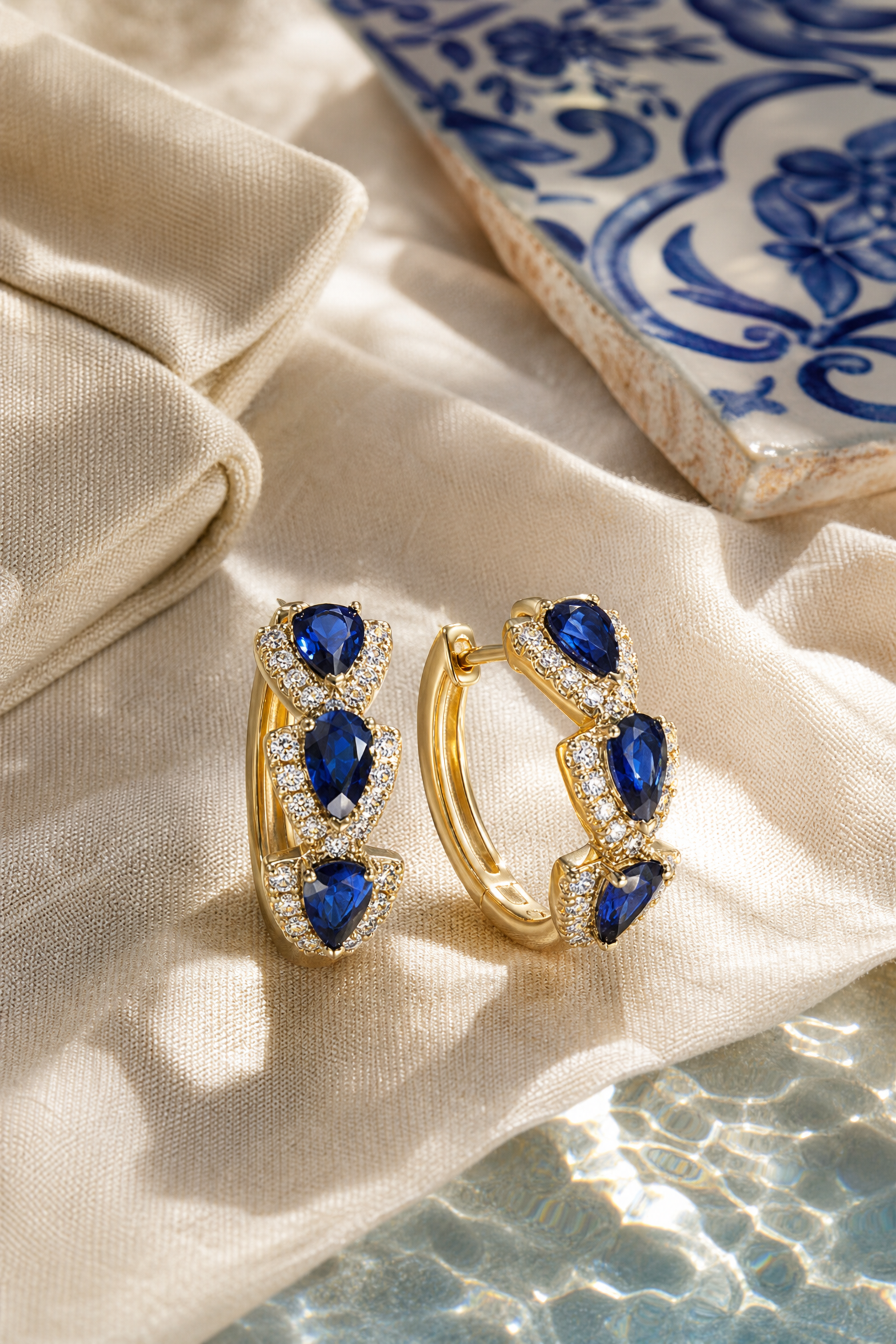 Notte sapphire hoops flat lay
