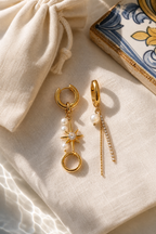 Scala pearl earrings flat lay