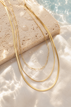 Water on the gold snake chain