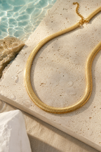 Water on the gold herringbone chain
