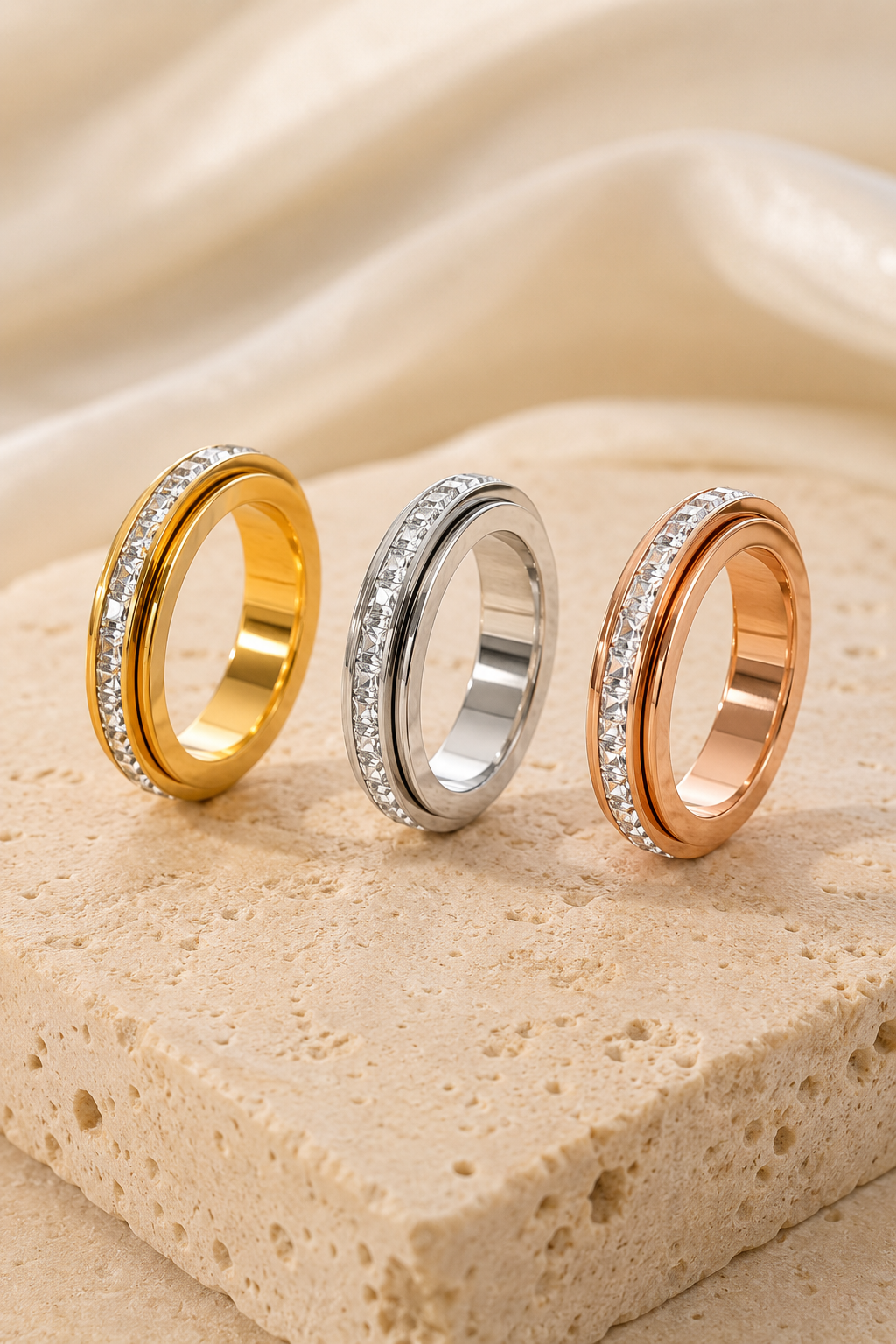 Calma spinner ring in gold, silver and rose gold