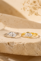 Onda marquise ring in white and gold tone side by side