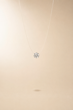 Goccia crystal suspended in mid-air on its invisible cord