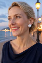 Woman at blue hour wearing the Ortensia crystal bloom studs
