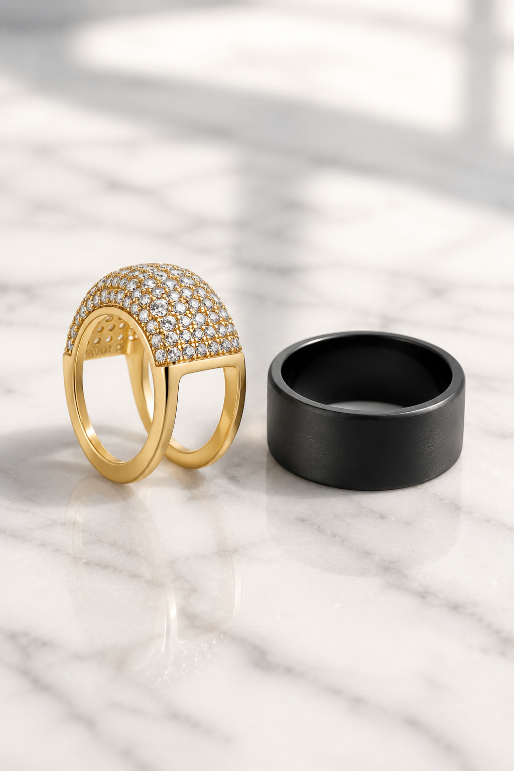 Cupola cover beside a plain black smart ring