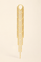 Single Cascata tassel earring on a cream background