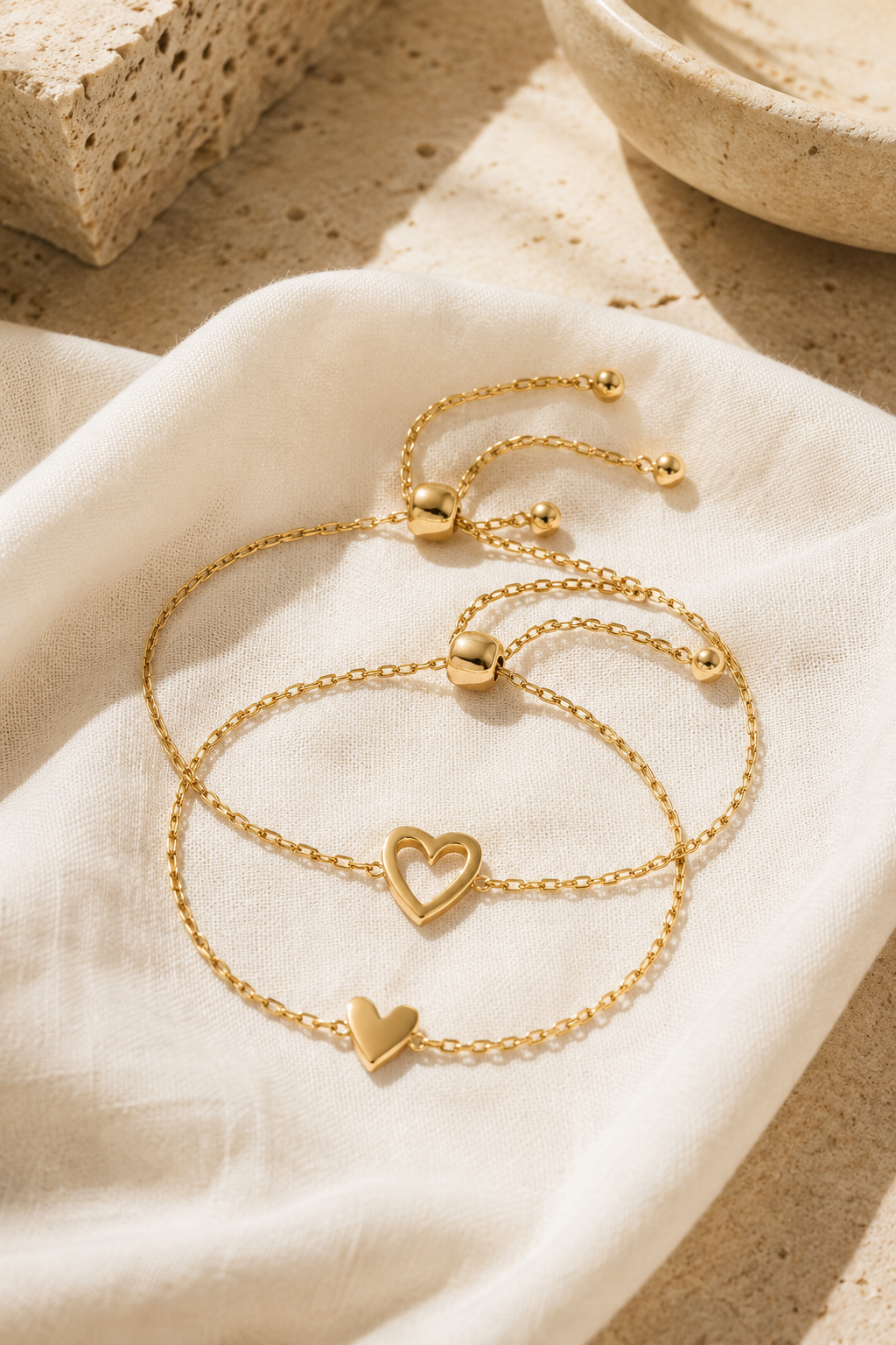 Sorella heart bracelet set on cream linen