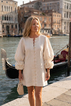 Petalo puff sleeve dress in off white, worn