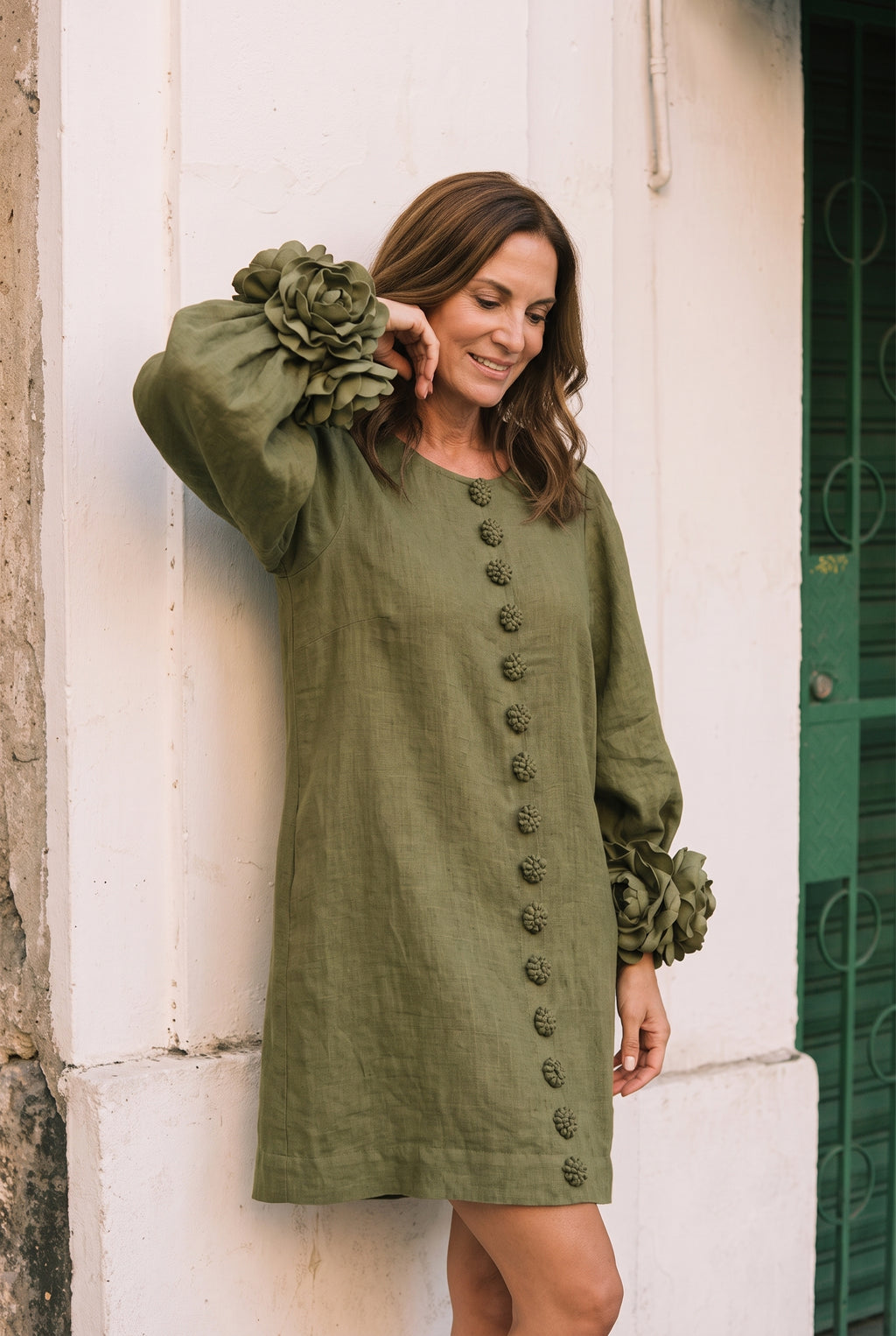 Petalo puff sleeve dress in olive green, worn