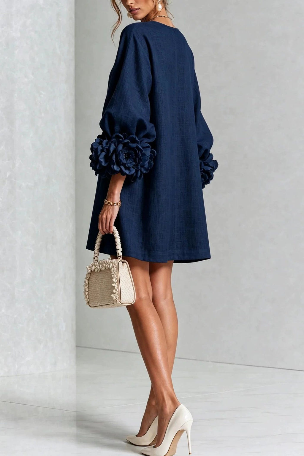 Petalo puff sleeve dress in navy blue, back view