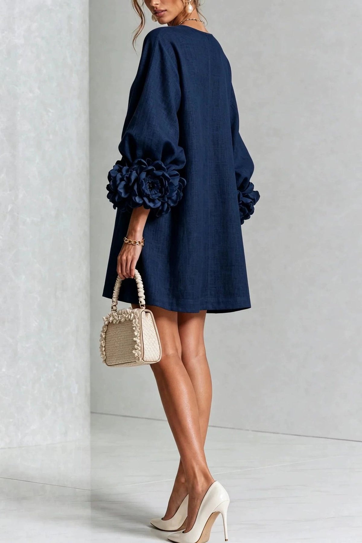 Petalo puff sleeve dress in navy blue, back view