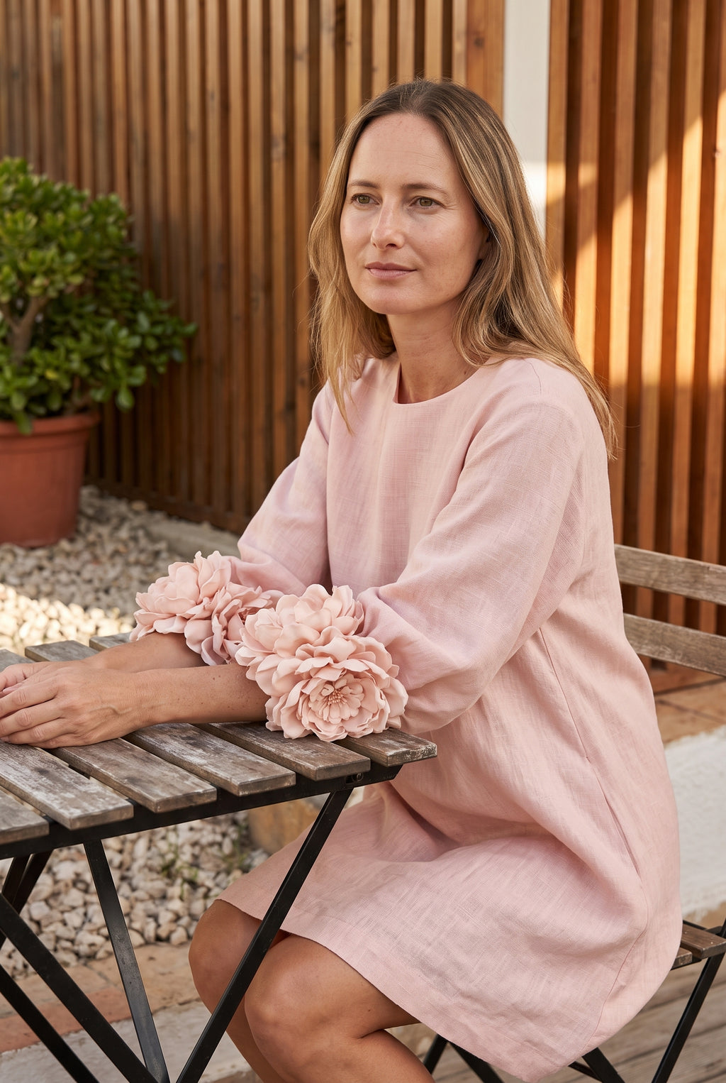 Petalo puff sleeve dress in pink, seated