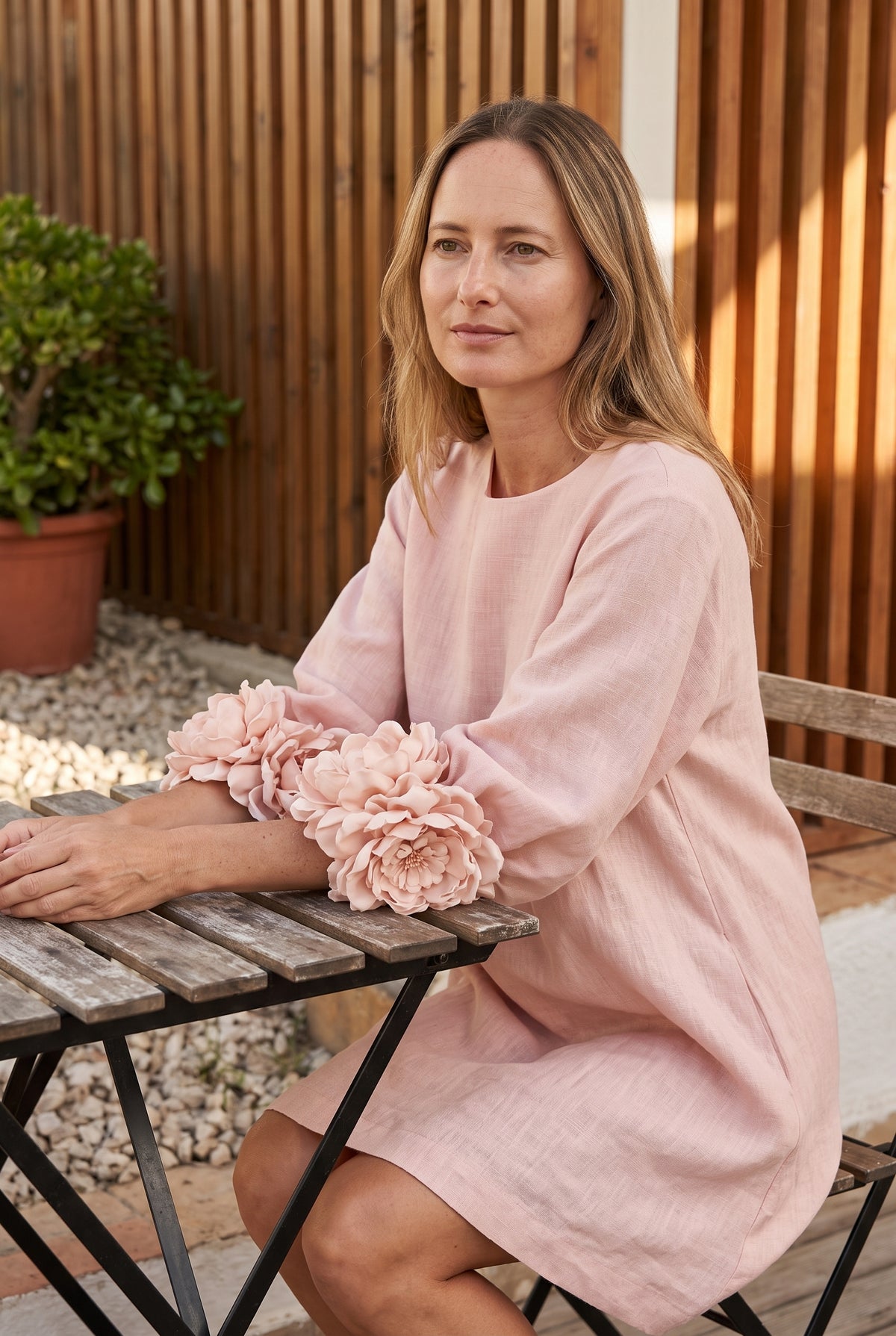 Petalo puff sleeve dress in pink, seated