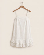 Praiano eyelet romper on a plain off-white background