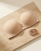 Salda strapless bra on warm travertine stone