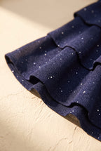 Scintilla dress, shimmer fabric and ruffle hem detail