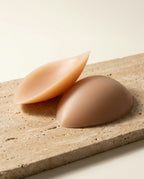 Sirena lift inserts on warm travertine stone