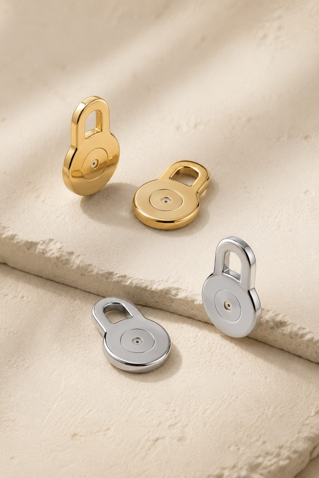 Solleva lobe lifters in yellow gold and white gold