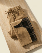Vietri barrel pant on warm travertine stone