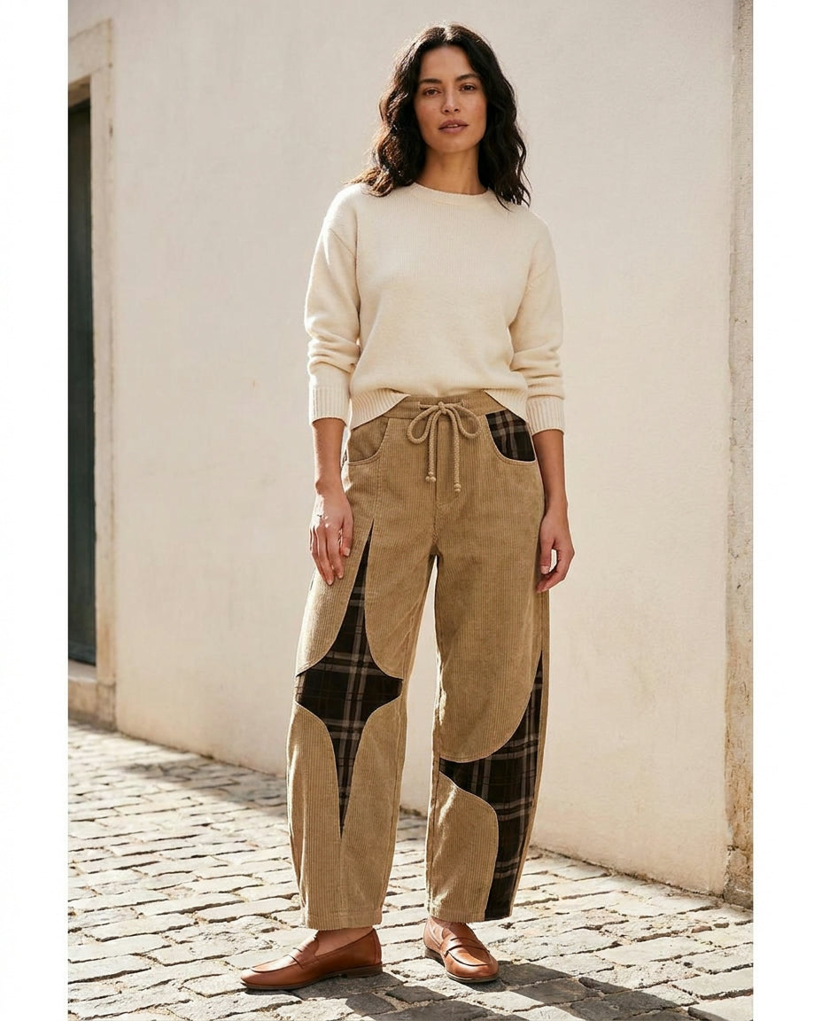 Woman wearing the Vietri barrel pant on a sunlit stone street
